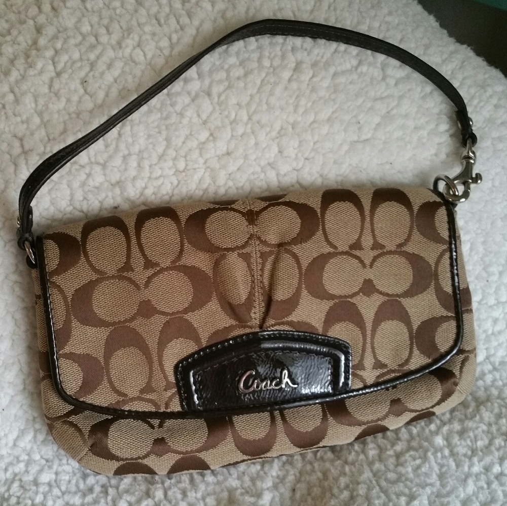 Coach clutch/ wristlet